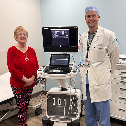 Dr. McComb Helps Lifelong Lansing Residents Mike and Faith Give Back to the Hospital After They Received Emergency Cardiology Care